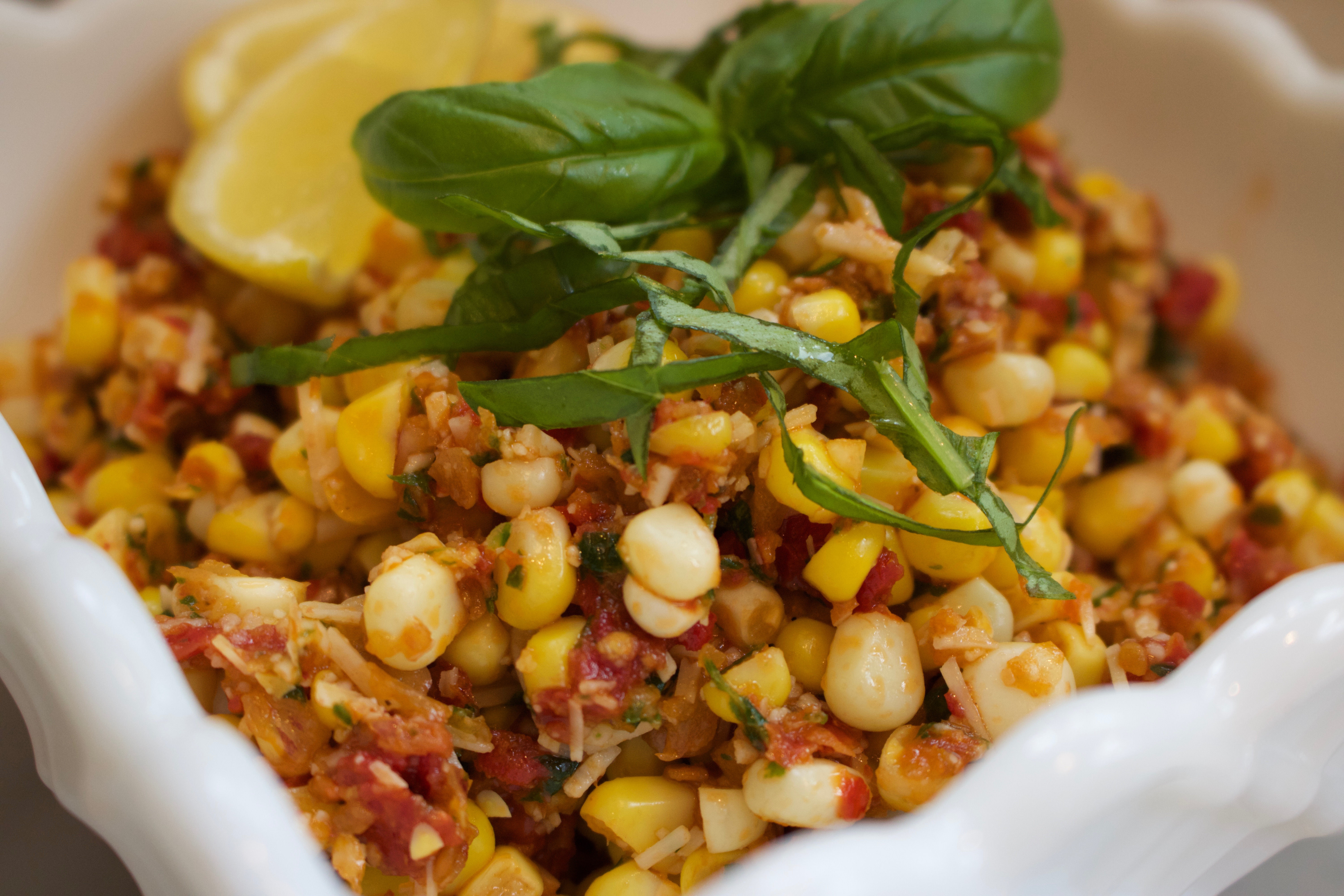 Corn salad with sun dried tomatoes and basil