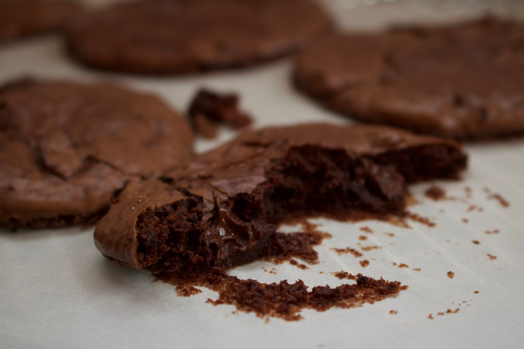 Let them cool so they don't break when remove them from the parchment paper