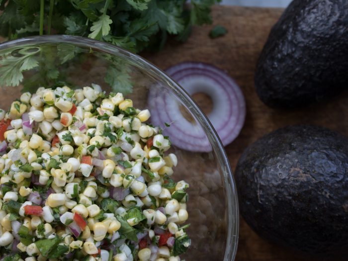 Corn salsa in a glass bowl