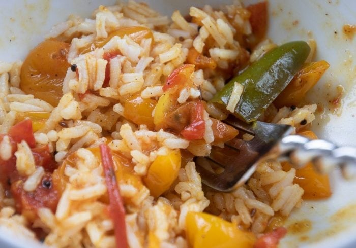 cooked tomato chutney with rice