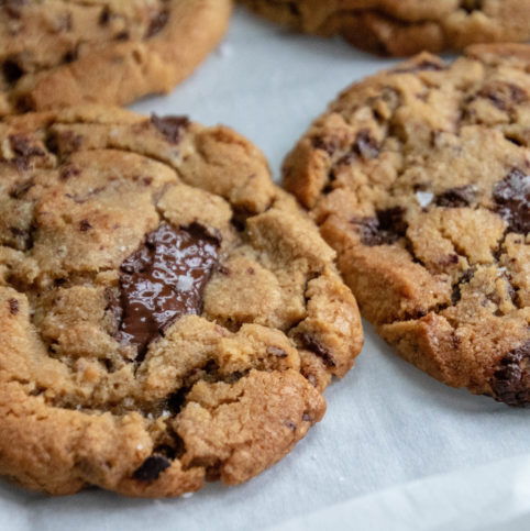 Giant Chocolate Chip cookies with cocoa nibs and Kosher salt